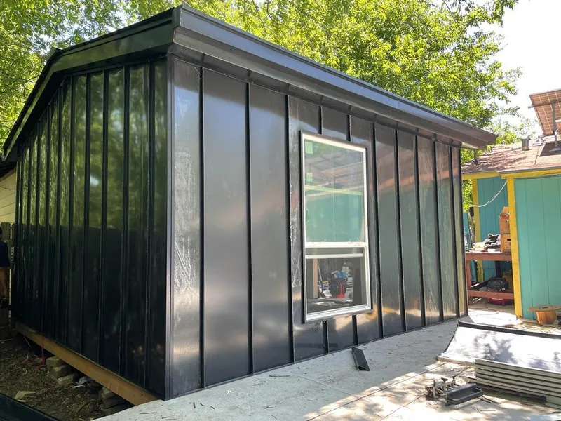 Black standing seam metal wall panels for Roof Inspection in Sherwood