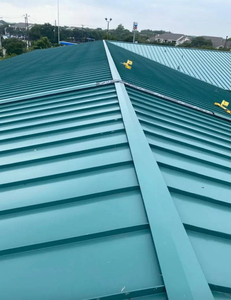 Green commercial metal roof ridge and valley for Metal Roof Repair in Sherwood