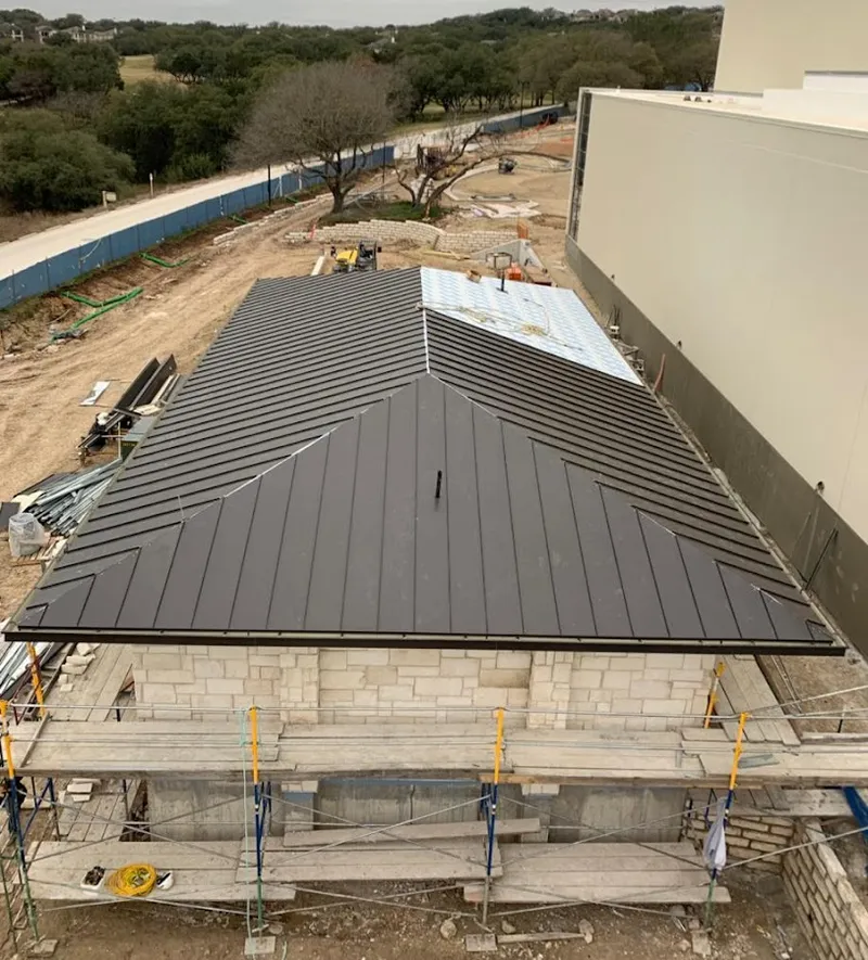 Metal roof new construction with scaffolding in Sherwood